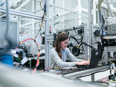 Professional printer repair service - technician fixing laser printer